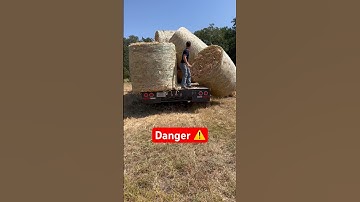 Unloading bales the hard way #farmlife #howto #texas #ranching