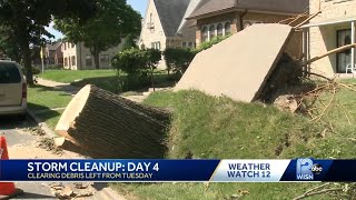 Post-storm debris clean up continues, crews working to restore power