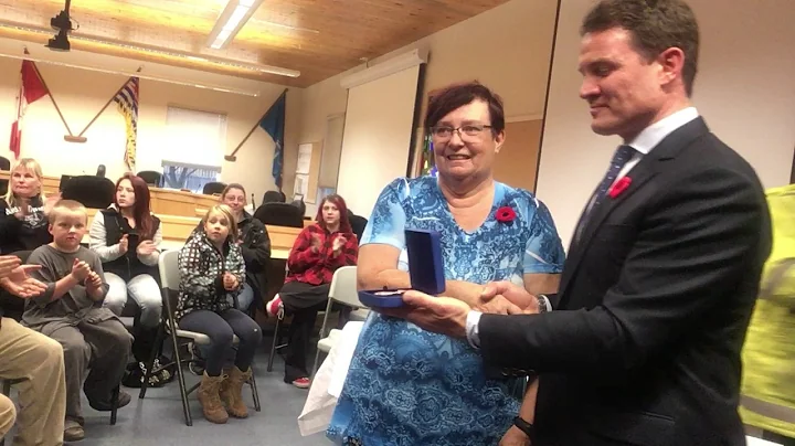 Jeannie Cramer presented the Sovereign's Medal for...