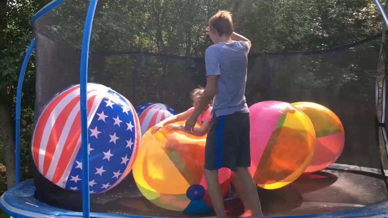 Putting 7 5ft Beach Balls On Our Trapmoline! - YouTube