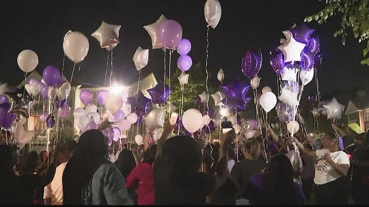 Mother of 4 remembered at vigil days after killing...