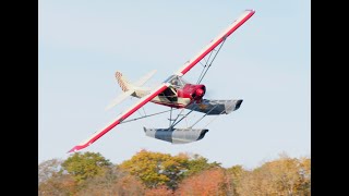 Floatplane Lands On A Field Of Clover