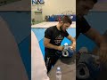 Khabib Nurmagomedov Repairs his head gear "Mister Reebok"