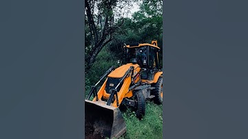 JCB backhoe loader loading a truck with material using the front bucket. #tractor #jcb #shortvideo