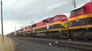 Q561 with 6 EX KCS SD70MAC’s