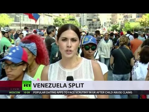 Rival rallies over US aid held across Venezuela