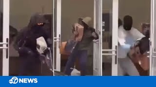 Video shows suspected thieves sprinting out of California Neiman Marcus with designer handbags