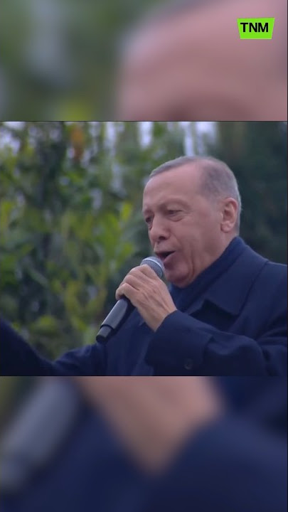 Turkish president Erdogan singing on campaign bus in Istanbul after being re-elected.
