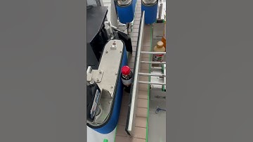 Cách máy in và dán nhãn chai tròn một cách chính xác