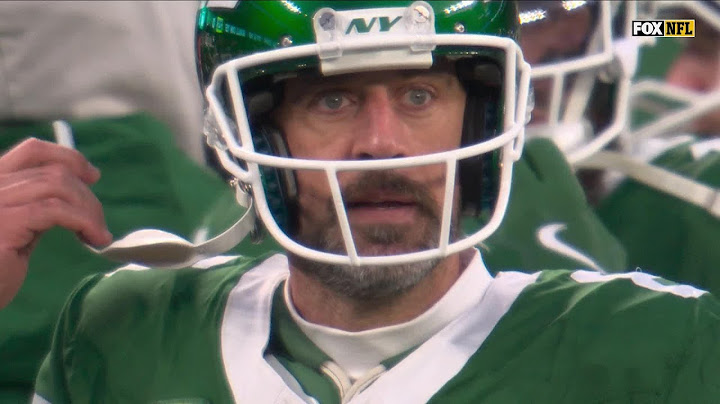 Aaron Rodgers throws tipped-ball INT to Jevon Holland on his first pass of day