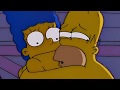 Marge y Homero desnudos en el campo de golf