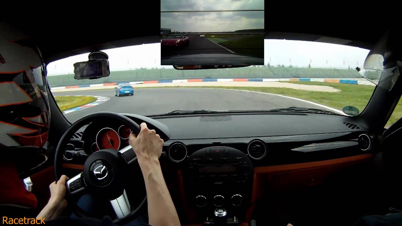 EuroSpeedway 25.04.2011 Turn 18 Mazda MX-5 NC1 vs. Pontiac Solstice with a turner ending in the dirt