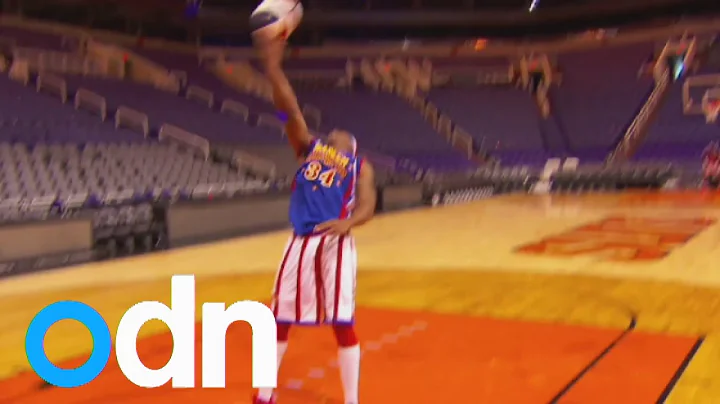 World record: Watch Harlem basketball player make amazing 82-foot backward shot