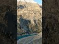 “Would You Visit This Lake Surrounded by Mountains? 👀💙🏔️”#explore#LakeView#scenicview#HiddenParadise