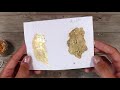 Using Gilding Flakes to Create a Marbled Background -