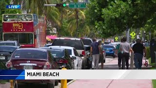 2 people robbed in Miami Beach