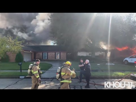 Raw video: Firefighters work to put out house fire in La Porte, Texas