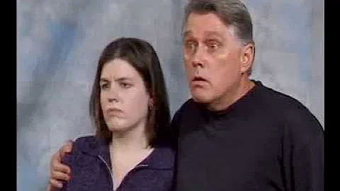 "I WANT A DIVORCE"   (MAN WITH ARM AROUND WIFE)