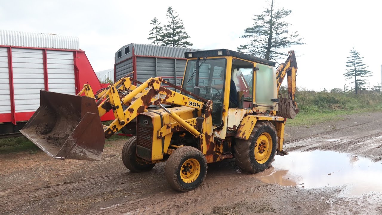 Cheapest Backhoe on the Internet Digs and Scoops Earth