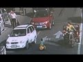 Boy rides toy car into rush hour traffic