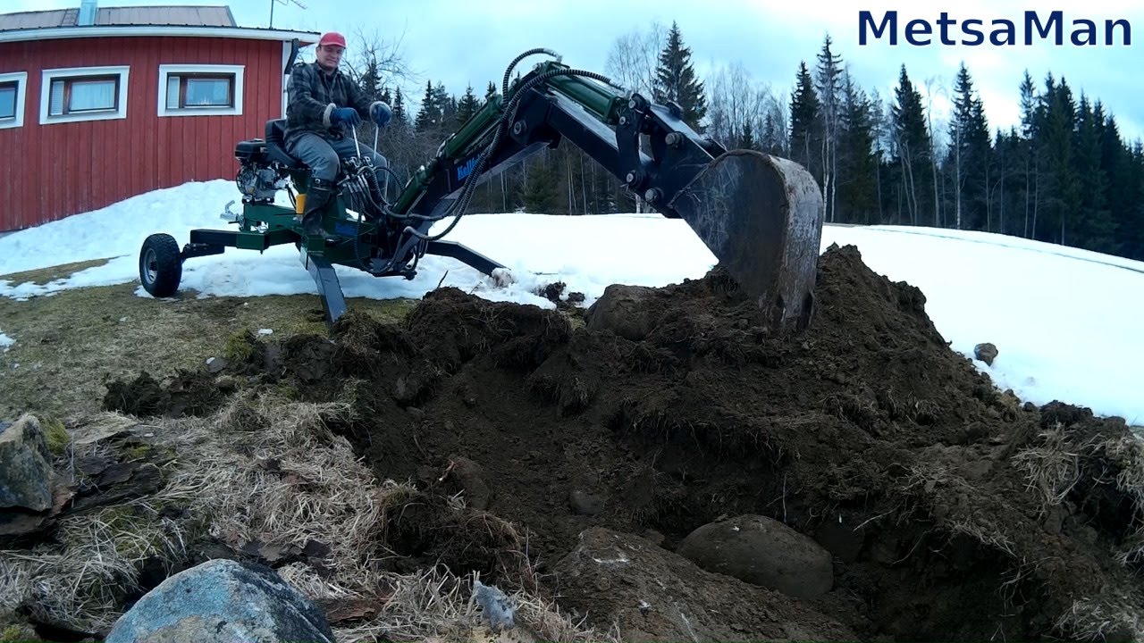 Bury some stones with tiny backhoe Kellfri