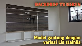 Backdrop Tv Gantung Dengan Variasi Lis Stainlis