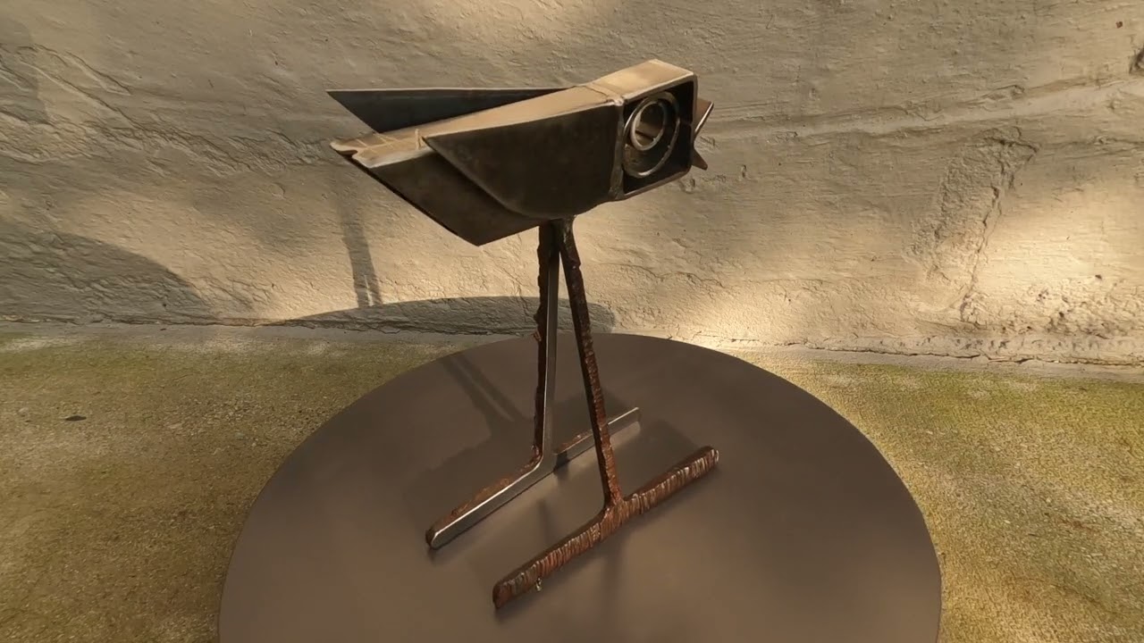 Whimsical Metal Bird Sculpture