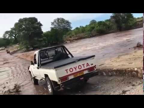 fmi Van swept away on flooded bridge