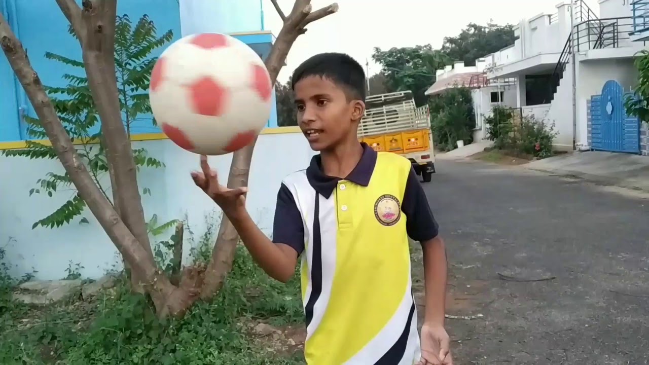 How to spin football in hand YouTube