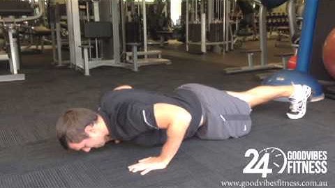 Push up with alternate hand reach intermediate