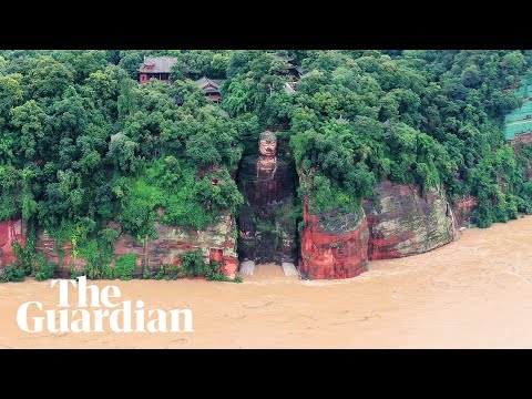 China floods: Leshan Giant Buddha statue at risk after torrential rainfall