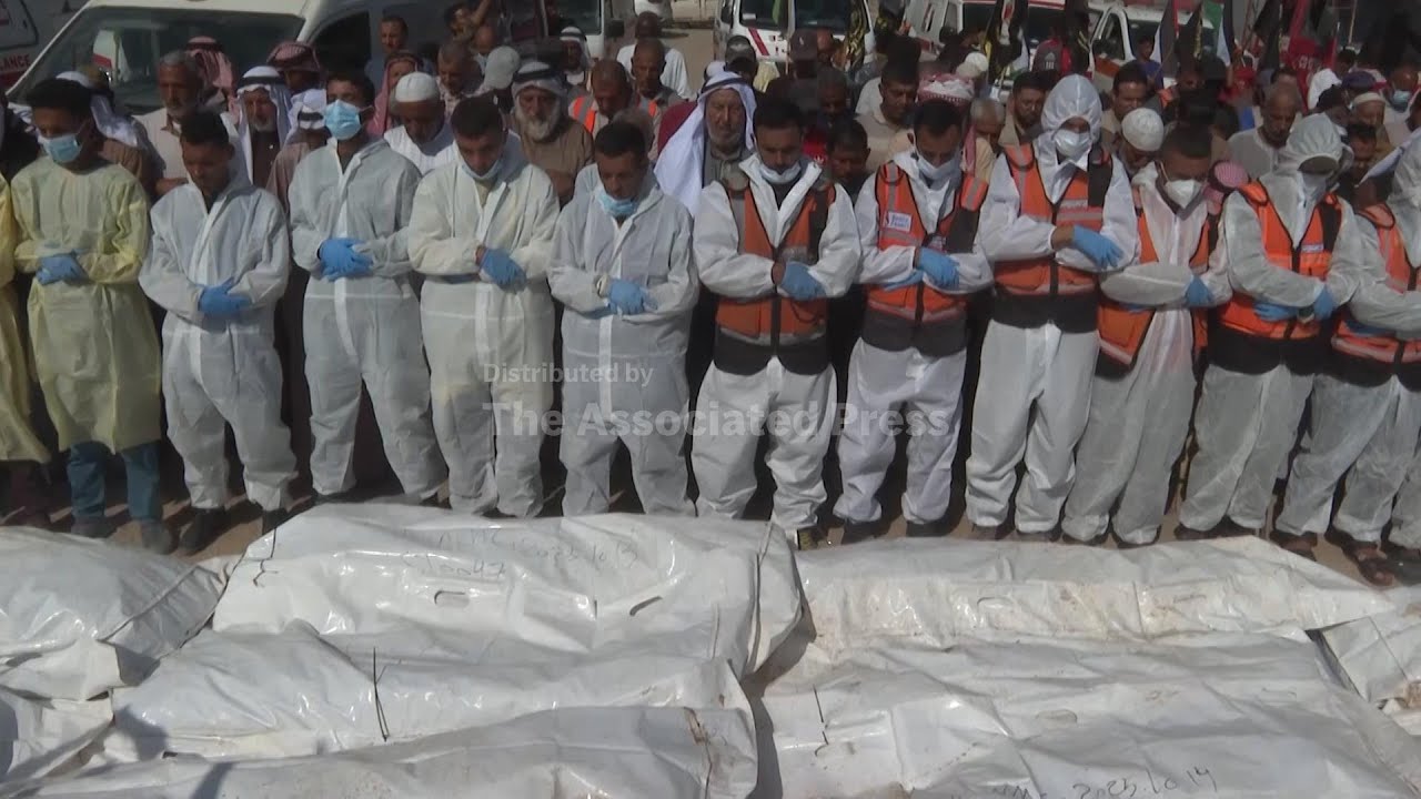 Prayers for the dead as bodies of 54 Palestinians buried in Gaza after return by Israel