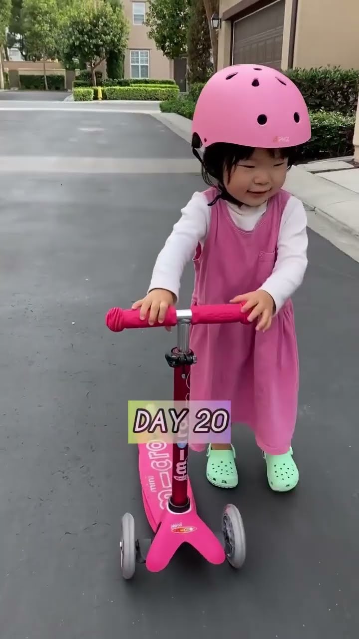 Baby learns how to SCOOTER