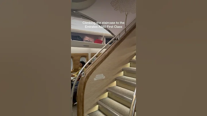 Climbing The Staircase To The Emirates A380 First Class | Lounge Guru