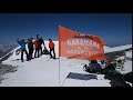 Флаг GanaMana Adventure на вершине Эльбруса