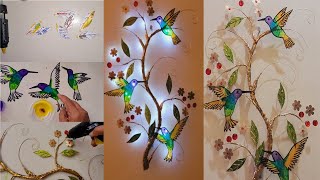 Picaflor decorativa de cartón y botellas. Decorative hummingbird made of cardboard and bottles