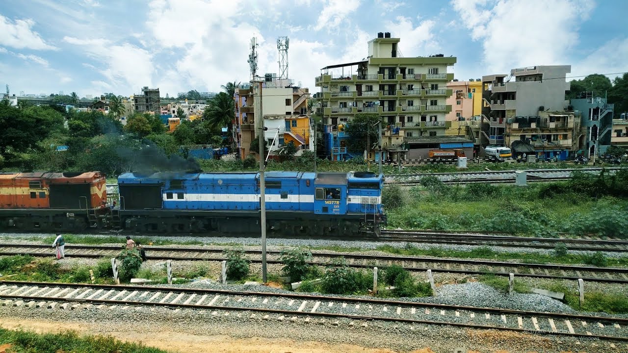 Loco Pilot Acknowledges By Waving Hands