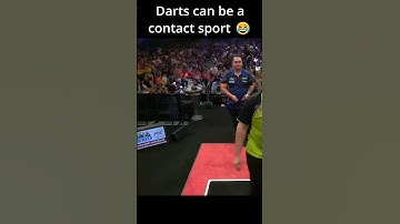 Darts players bumping into each other
