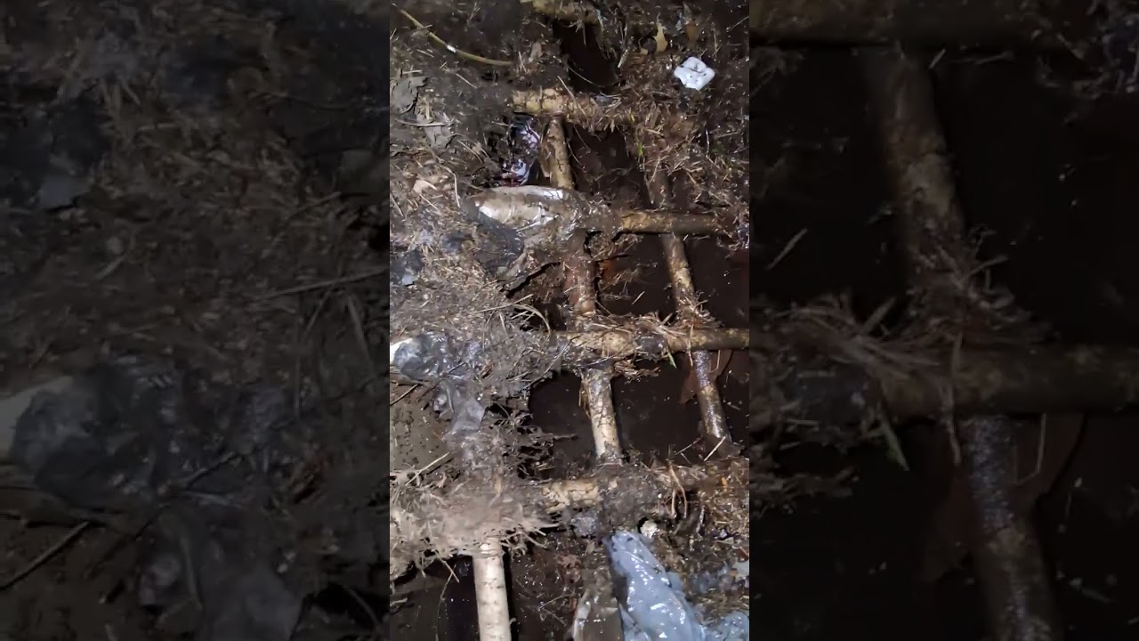Drainage ditch clogged attempt to unclog