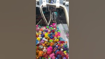 WEIRD duck claw machine #shorts #clawmachine #weird #arcade #toys #daveandbusters