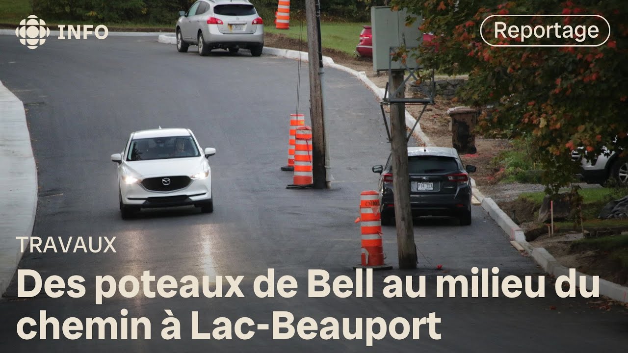 Des poteaux de Bell au milieu du chemin à Lac-Beauport