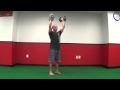 Standing dumbbell overhead press