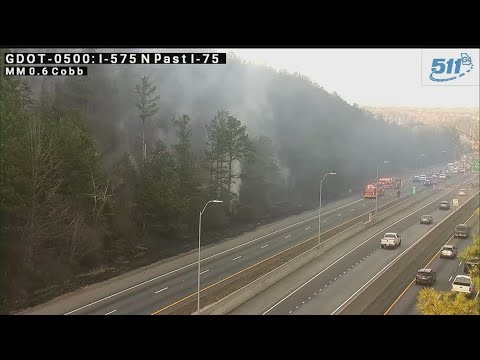Brush fire causes major slowdown on I-575 - YouTube