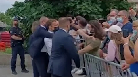 Watch French President Macron get slapped across the face while in southern France - DayDayNews