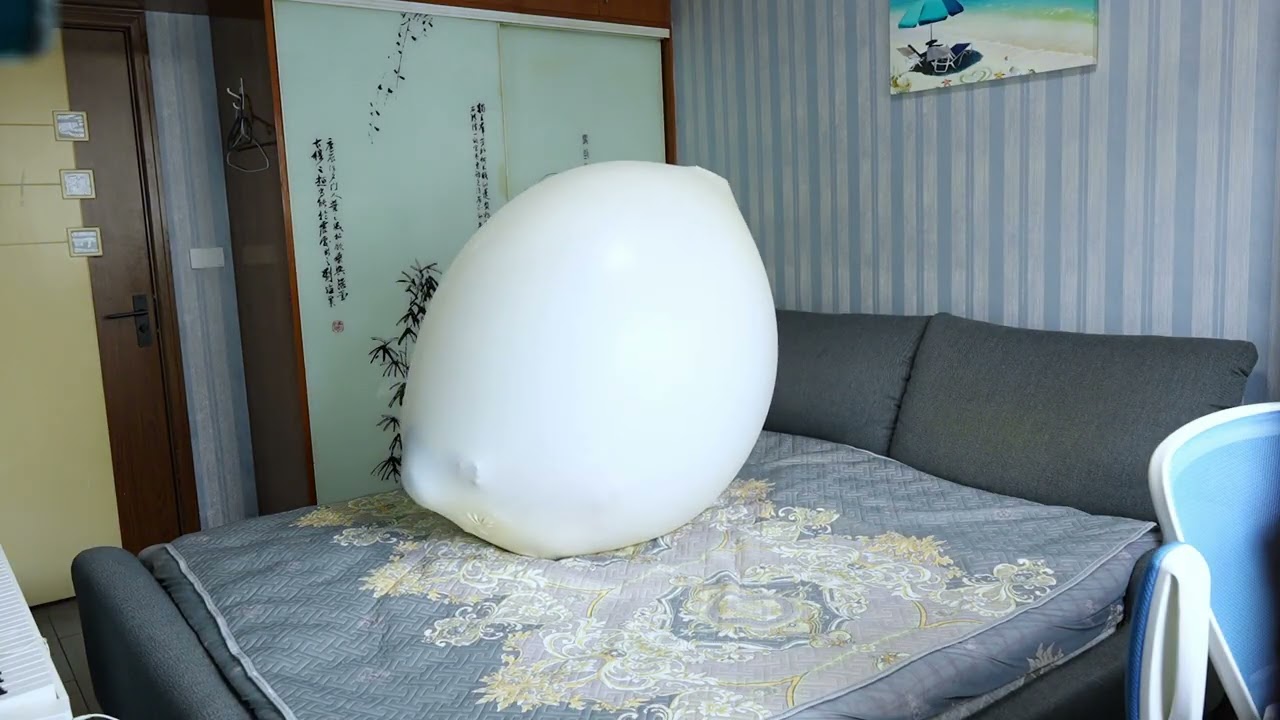Climb in Balloon - A Man inside a giant human egg?!
