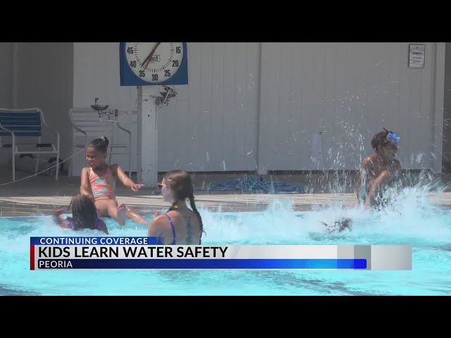 Peoria kids learn water safety from the best, meet NBA legend