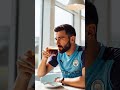Man city player drinking coffee