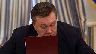 Ukraine's parliament dismisses President Yanukovych