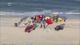 Girl dies, brother hospitalized after falling in 6-foot-deep beach pit