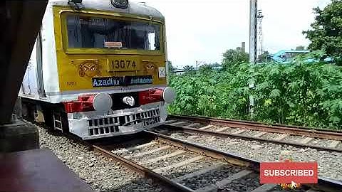 Chandanpur - Howrah Emu Local Train Crossing To The Railroad.